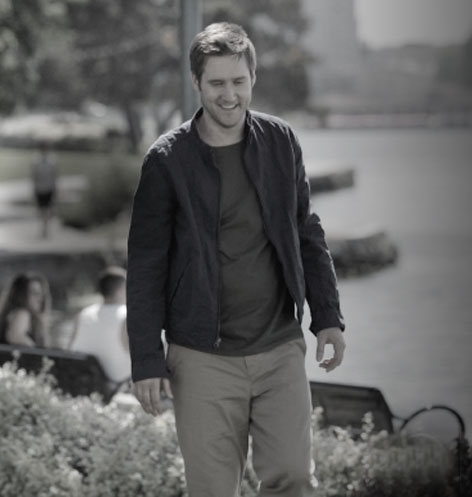 A person waiting by a train